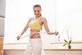 Diet. Dieting concept. Woman in Sportswear Measuring Her Waist Royalty Free Stock Photo