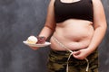 Diet, dieting, junk food concept. Young obese overweight woman w Royalty Free Stock Photo