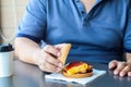 Diet failure of fat man eating fast food hamberger. Happy smile overweight person . Hate to diets. Very fat man eating fast food, Royalty Free Stock Photo