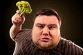 Diet fat man eating healthy food . Healthy breakfast with vegetables. Royalty Free Stock Photo