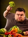 Diet fat man eating healthy food. Healthy breakfast with vegetables. Royalty Free Stock Photo