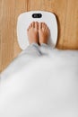 Diet. Female Feet On Weighing Scale. Weight Loss. Healthy Lifestyle. Royalty Free Stock Photo