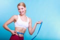 Diet. Fitness woman fit girl with measure tape measuring her waist Royalty Free Stock Photo