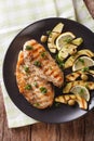 Diet Food: Grilled chicken breast with avocado, lemon and olive