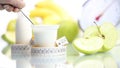 Diet food teaspoon blending yogurt fruit Apple meter and scales balance