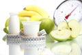 Diet food yogurt fruit Apple meter scales Royalty Free Stock Photo