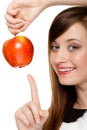 Diet. Girl offering apple seasonal fruit. Royalty Free Stock Photo