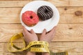 Diet. hands of a centimeter. sweet Donuts