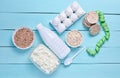 Diet, healthy food. Bottle of yogurt, crispy round bread, buckwheat noodles, oatmeal, cottage cheese, egg tray Royalty Free Stock Photo