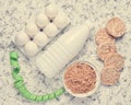 Diet, healthy food. Crispy round dietary bread, a bottle of yogurt, buckwheat noodles, plastic egg tray on a white concrete Royalty Free Stock Photo