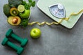Diet and Healthy life Concept. Green apple and Weight scale measure tap with fresh vegetable Royalty Free Stock Photo