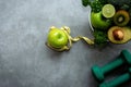 Diet and Healthy life loss weight Concept. Green apple and Weight scale measure tap with fresh vegetable and sport equipment for w Royalty Free Stock Photo