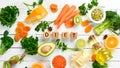 `DIET` inscription: Avocado, carrot, orange, broccoli, dried fruits, nuts and parsley.