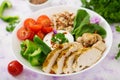 Diet menu. Healthy lifestyle. Oatmeal porridge, chicken fillet and fresh vegetables Royalty Free Stock Photo