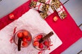 Diet muesli bars with detox apple cinnamon water on red pepper and wooden background. Top view. Flat lay. Royalty Free Stock Photo