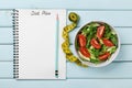 Diet plan, menu or program, tape measure, water and diet food of fresh salad on blue background, weight loss and detox concept