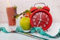 Diet program with red clock Intermittent fasting concept Royalty Free Stock Photo