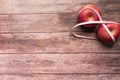 Diet red apple bind with measuring tape on the wooden backgrounds health and fitness life concept Royalty Free Stock Photo