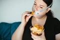 Obese woman with unhealthy food, eating disorder Royalty Free Stock Photo
