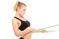 Diet. slim blonde girl with measure tape measuring waist Royalty Free Stock Photo