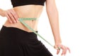 Diet. slim fit girl with measure tape measuring waist Royalty Free Stock Photo