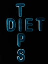diet tips text written on dark abstract background Royalty Free Stock Photo