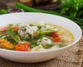 Diet vegetable soup with chicken meatballs and fresh herbs. Royalty Free Stock Photo