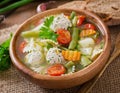 Diet vegetable soup with chicken meatballs and fresh herbs Royalty Free Stock Photo