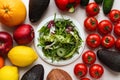 Diet and weight loss concept. Various vegetables, fruits, plate with salad leaves and measuring tape. Selective focus Royalty Free Stock Photo