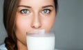 Diet and wellness, young woman drinking milk or protein shake cocktail Royalty Free Stock Photo