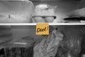 Diet written on a sticky note stuck on a fridge shelf with food Royalty Free Stock Photo