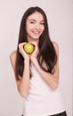 Diet. The young beautiful girl who cares for her figure, making Royalty Free Stock Photo