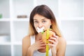 Diet. Young beautiful woman eating burger, It`s junk and unhealt