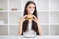 Diet. Young woman with duct tape over her mouth, preventing her Royalty Free Stock Photo