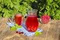 Dietary detox drink with lemon juice, red strawberry, cherry and raspberry in clear water with ice Royalty Free Stock Photo