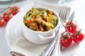 Dietary pasta with spinach, zucchini and cherry tomatoes