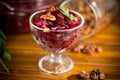 Dietary salad of boiled beets with walnuts Royalty Free Stock Photo