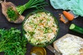 Dietary salad with cabbage, cucumber, carrot, greens. Juicy spring salad with fresh vegetables Royalty Free Stock Photo