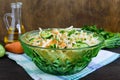 Dietary salad with cabbage, cucumber, carrot, greens. Juicy spring salad with fresh vegetables Royalty Free Stock Photo