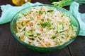 Dietary salad with cabbage, cucumber, carrot, greens. Juicy spring salad with fresh vegetables Royalty Free Stock Photo