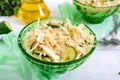 Dietary salad with cabbage, cucumber, carrot, greens. Juicy spring salad from fresh vegetables Royalty Free Stock Photo