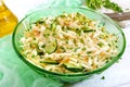 Dietary salad with cabbage, cucumber, carrot, greens. Juicy spring salad from fresh vegetables Royalty Free Stock Photo