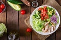 Dietary salad with chicken, avocado, cucumber, tomato and Chinese cabbage. Royalty Free Stock Photo