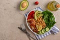 Dietary salad with chicken, avocado, cucumber, tomato and spinach Royalty Free Stock Photo