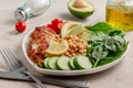 Dietary salad with chicken, avocado, cucumber, tomato and spinach Royalty Free Stock Photo