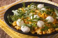 Dietary salad of corn, baby mozzarella and arugula close-up. horizontal