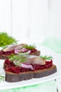 Dietary sandwiches with herring, boiled beets, red onion on rye bread Royalty Free Stock Photo