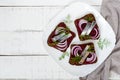 Dietary sandwiches with herring, boiled beets, red onion on rye bread Royalty Free Stock Photo