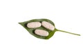 Dietary supplements in tablets lie on a leaf from a tree. isolated object Royalty Free Stock Photo