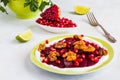 Dietary vegetarian salad of roasted beets with pomegranate seeds, walnuts caramelized in honey and natural yoghurt. Royalty Free Stock Photo